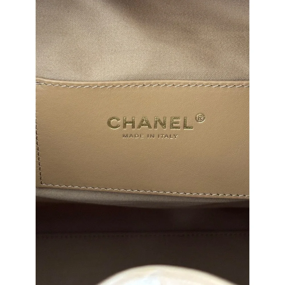 Chanel 25 Quilted Caviar Leather Beige Gold Hardware Drawstring CC, medium siz